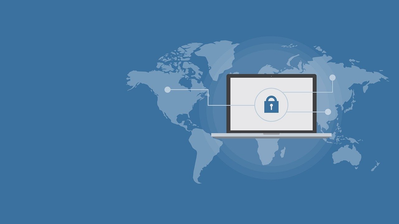 Global digital security concept with a laptop displaying a lock icon, symbolizing online protection and data security